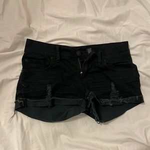 Ripped black denim shorts